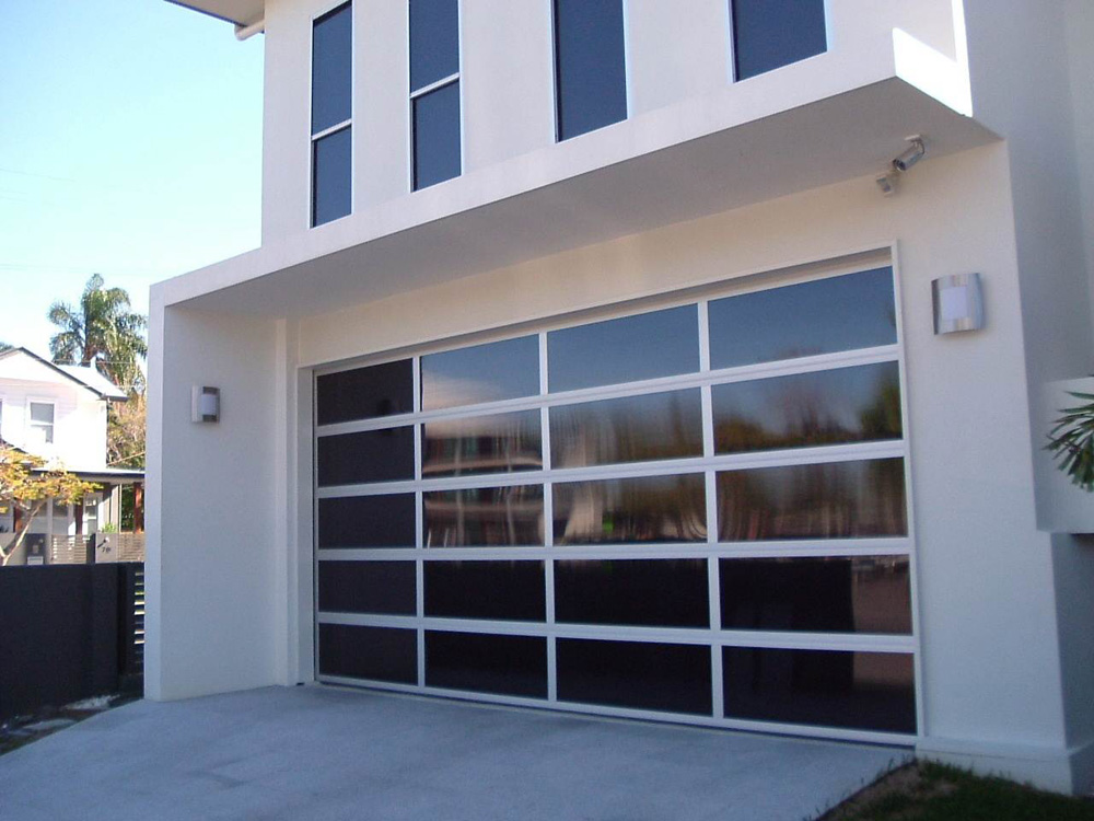 Glass sectional garage door for Villa